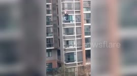 Chinese neighbours save five-year-old hanging from fifth-floor window of residential building