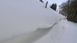 Like icing on a cake. Weird drifts and a look inside a snow tube in rare English snow