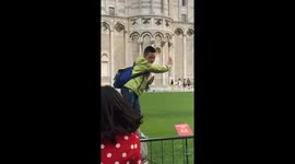 Epic Fail! Funny kid at Leaning Tower of Pisa in Italy
