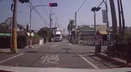 Lorry driver forgets to close container hatch then smashes into electricity post in Taiwan