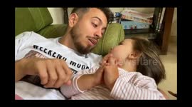 Adorable girl shocked when uncle tells a story