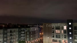 Nashville Tornado March 2. Sirens and emergency vehicles can be heard while the enormous wall cloud covering the city is visible with dramatic lightning flashes illuminating the boundary of the storm system.