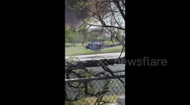 Helicopter gathers water amid Mann fire in Southern California