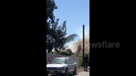 Helicopter flying over Mann fire in Southern California