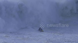 Wipeout of the year? Daring jetski rescue fails after US pro surfer Toby Cunningham gets crushed by giant wave