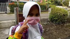 In Indonesia, children go to kindergarten wearing masks over coronavirus fears