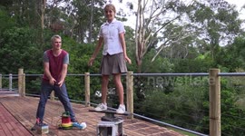 Australian dad prepares his daughter for school and the coronavirus with a toilet paper cannon.