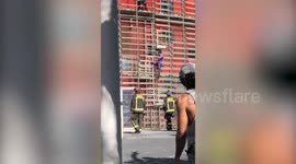 World-famous 'French Spiderman' free climbs 475-foot tower in just 25 minutes