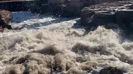 Warm spring weather and melt water causes frozen waterfalls to thaw early!