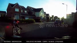 Dash Cam Child on a bike in a collision with car in residential area