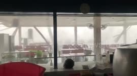 Storm rips through restaurant on second night of torrential weather in northern Thailand