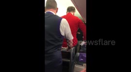 Flybe staff push UK man on trolley after company collapses seeing flights cancelled