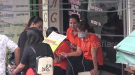Bangkok massage girls wear face masks to protect against coronavirus
