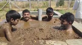 To protect themselves from coronavirus these Indians are bathing in cow dung
