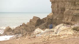 Overhanging Jurassic Coast cliff collapses in southwest England