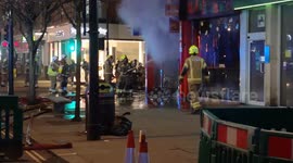 Firefighters To Contain A Fire In Oxford Street