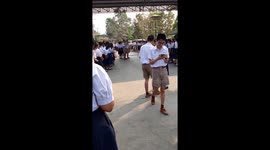 Pupils Take Cardboard Class Cut-Out To Graduation