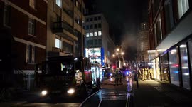 Firefighters Look For Possible Victims In Fire Damaged Building In Oxford Street