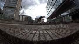 BMX Bike Rider rolling on front Wheel!