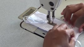 Female prison inmates in Thailand put to work making coronavirus face masks