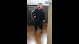 Tired toddler determined to dance
