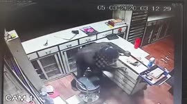 Security cam captures moment thief raids medical shop in western India