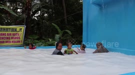 Strange pond in Indonesia baffles authorities when water turns white as milk