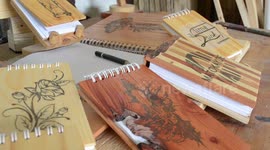 Carpenter carves up custom notebook covers using scrap wood in Indonesia