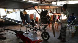 A MAN MAKE AIRPLANE ULTRALIGHT TYPE