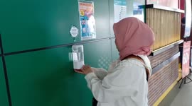 Indonesia's public transport system installs body temperature detectors and hand sanitiser stations to combat COVID-19