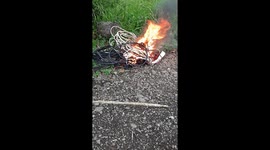 Poor people burning wires to retrieve copper and then sell it to buy bread