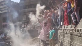 Indian festival-goers throw human ashes at each other in strange ritual