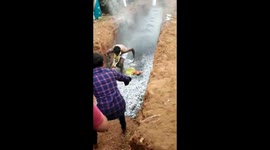 Daredevil priest dramatically falls while sprinting across hot coal in India