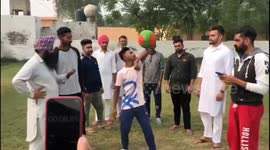 Indian boy breaks Guinness world record for longest time to spin basketball on the elbow
