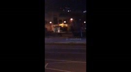 Two car collision into traffic light