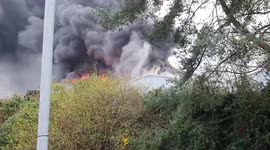 Massive fire rips through industrial estate in Reading, southern England