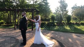 Wife pranks husband on their wedding day with 'first look' tiger mask