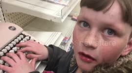 Kid is floored to realize that a typewriter has no wifi technology