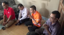 Health workers give out cannabis oil to elderly residents in Thailand