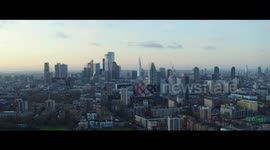 London City Aerial View of Skyline at Sunrise, descending. Feb 2020 - 5K