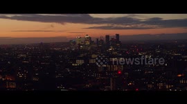 Aerial View of London City Skyline and Canary Wharf at Sunrise, Parallax. Feb 2020 - 5K