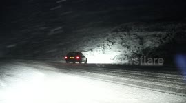 Scary moment car spins out on snow at night on Glenshane Pass in Northern Ireland