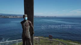 Santa Cruz Surfer statue given mask to raise coronavirus awareness