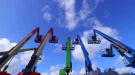 Time lapse of cherry pickers (boom lifts) at a plant hire depot in Leeds