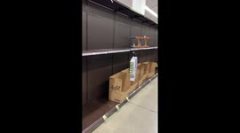 Grocery store aisles empty from panic buying in Los Angeles ca