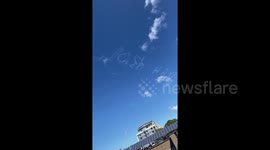 'Wash hands' painted above Sydney by mystery skywriter