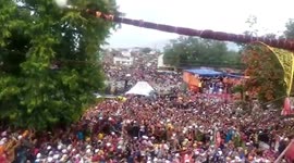 Eight injured when giant flag pole falls on Indian Holi festival crowds