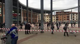 Italian shoppers queue up six foot away from each other during country's coronavirus lockdown