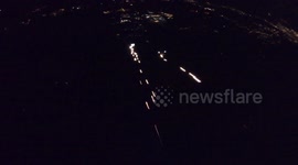 Insane wingsuit flight by night with fireworks, went to jump from dent de crolles and give some light to this dark night