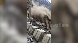 Huge landslide tears down Indian mountainside and blocks major road